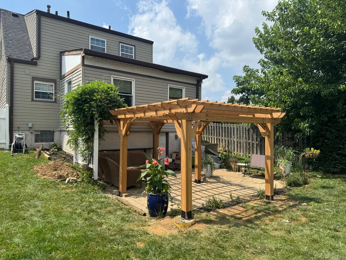 Cedar pergola and paver patio for residential outdoor living