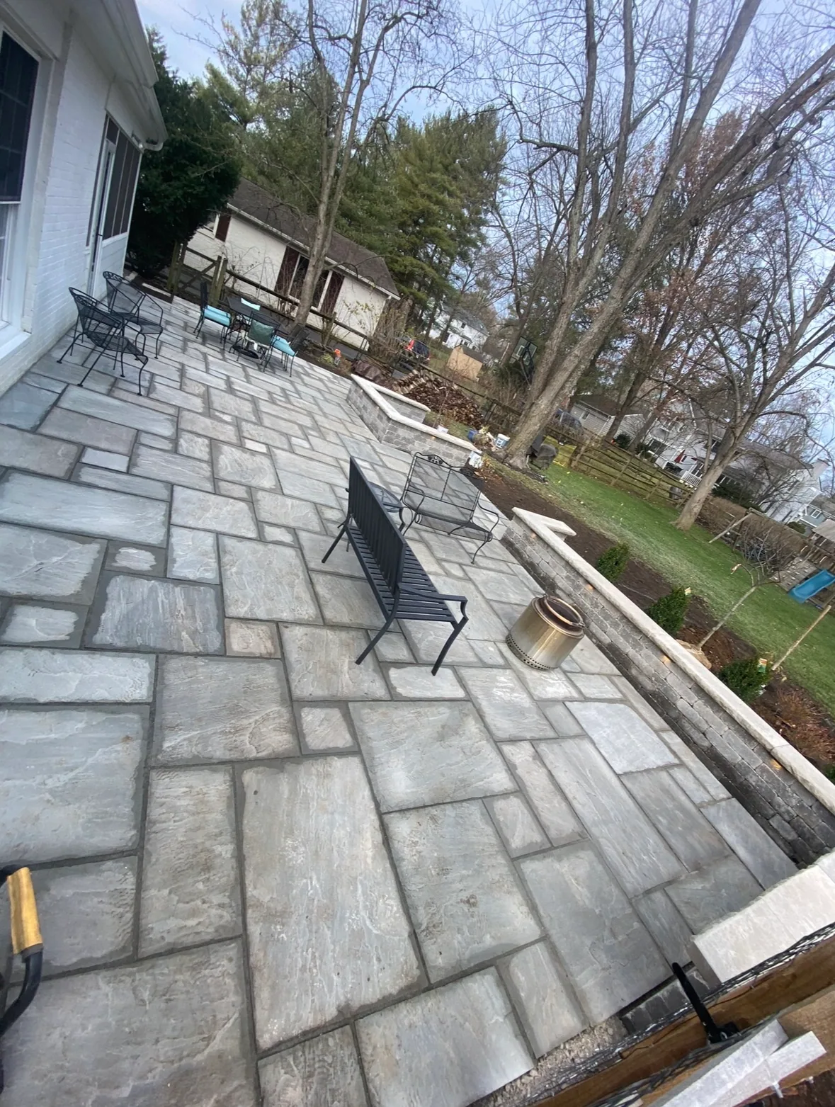 Illuminated natural-stone patio, view 2